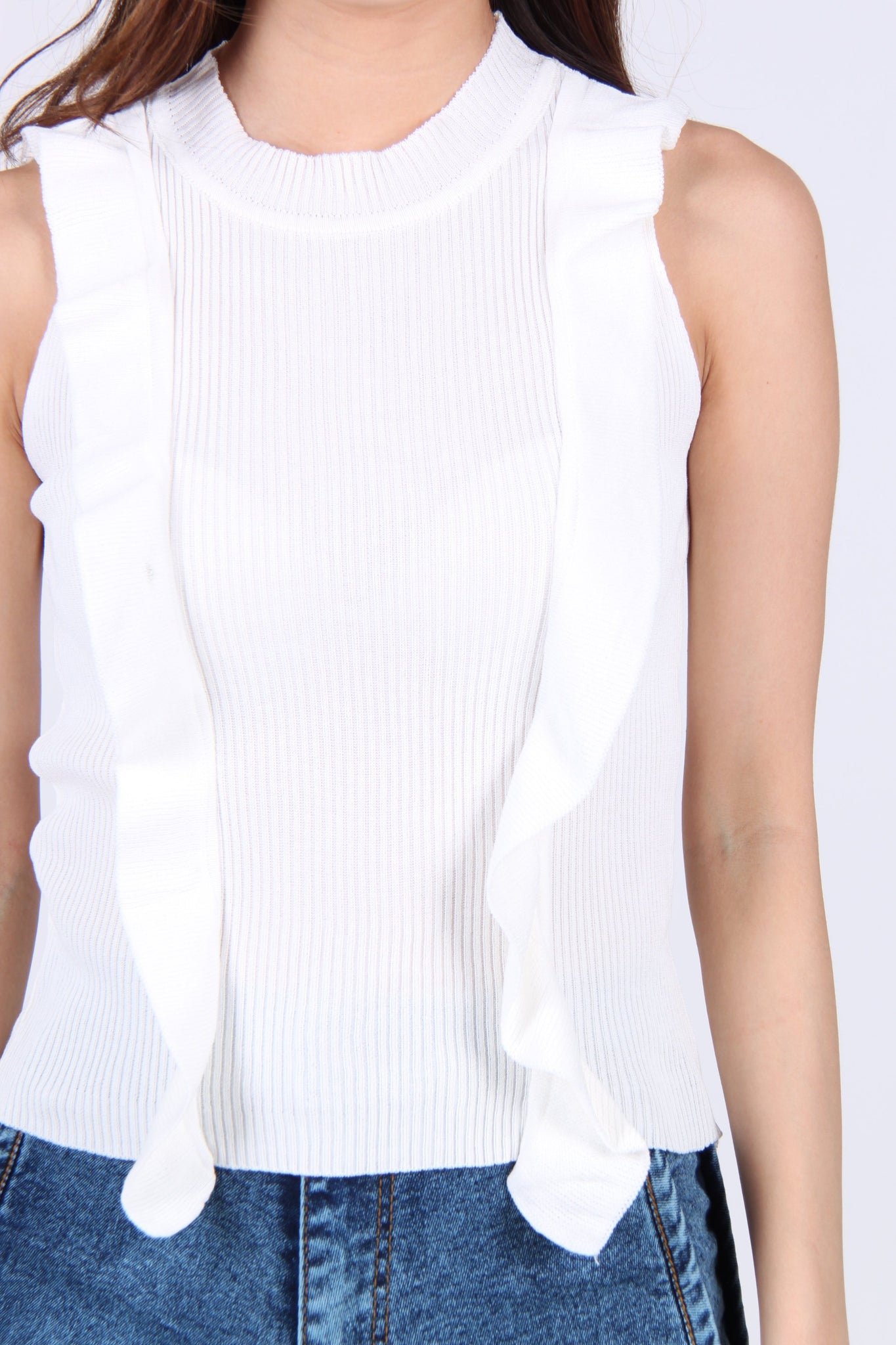 Front Ruffles Down Sleeveless Knit Top in White